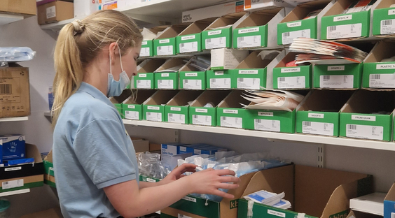 A supported intern student working in the pharmacy department